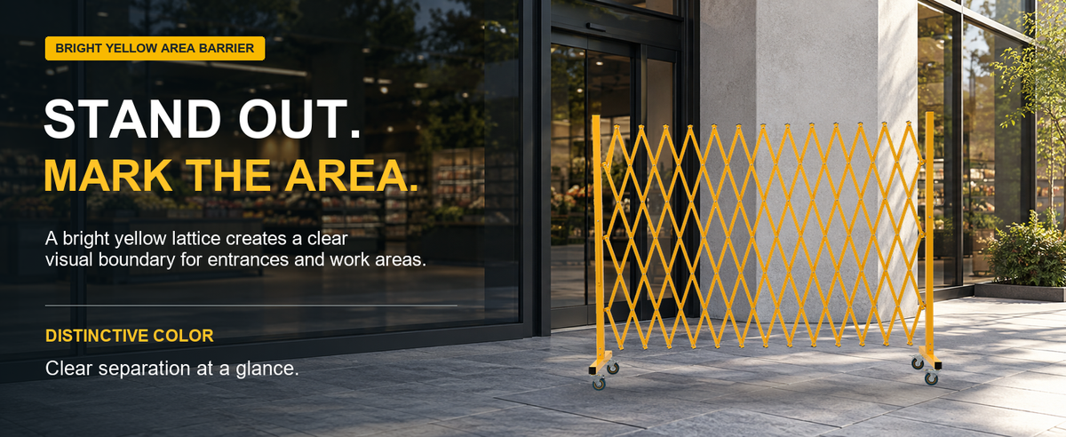 Bright yellow expanding lattice barrier marking an entrance and work area.